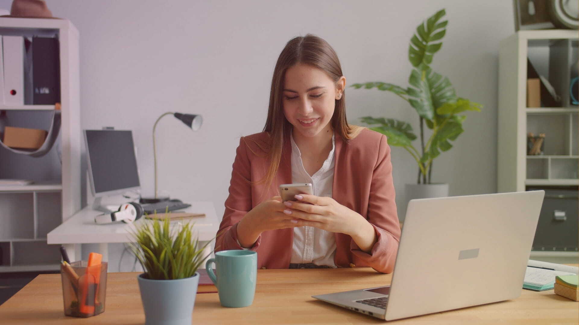 Business user refining AI prompts on a laptop